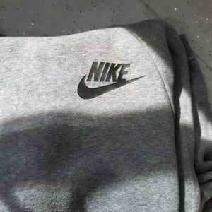 Women’s grey Nike hooded sweatshirt